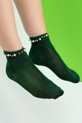 Glitzernde Lurex-Socken mit Perlen